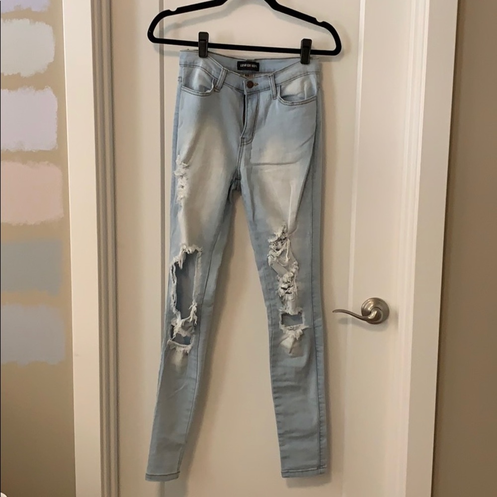 Light wash distressed high rise jeans